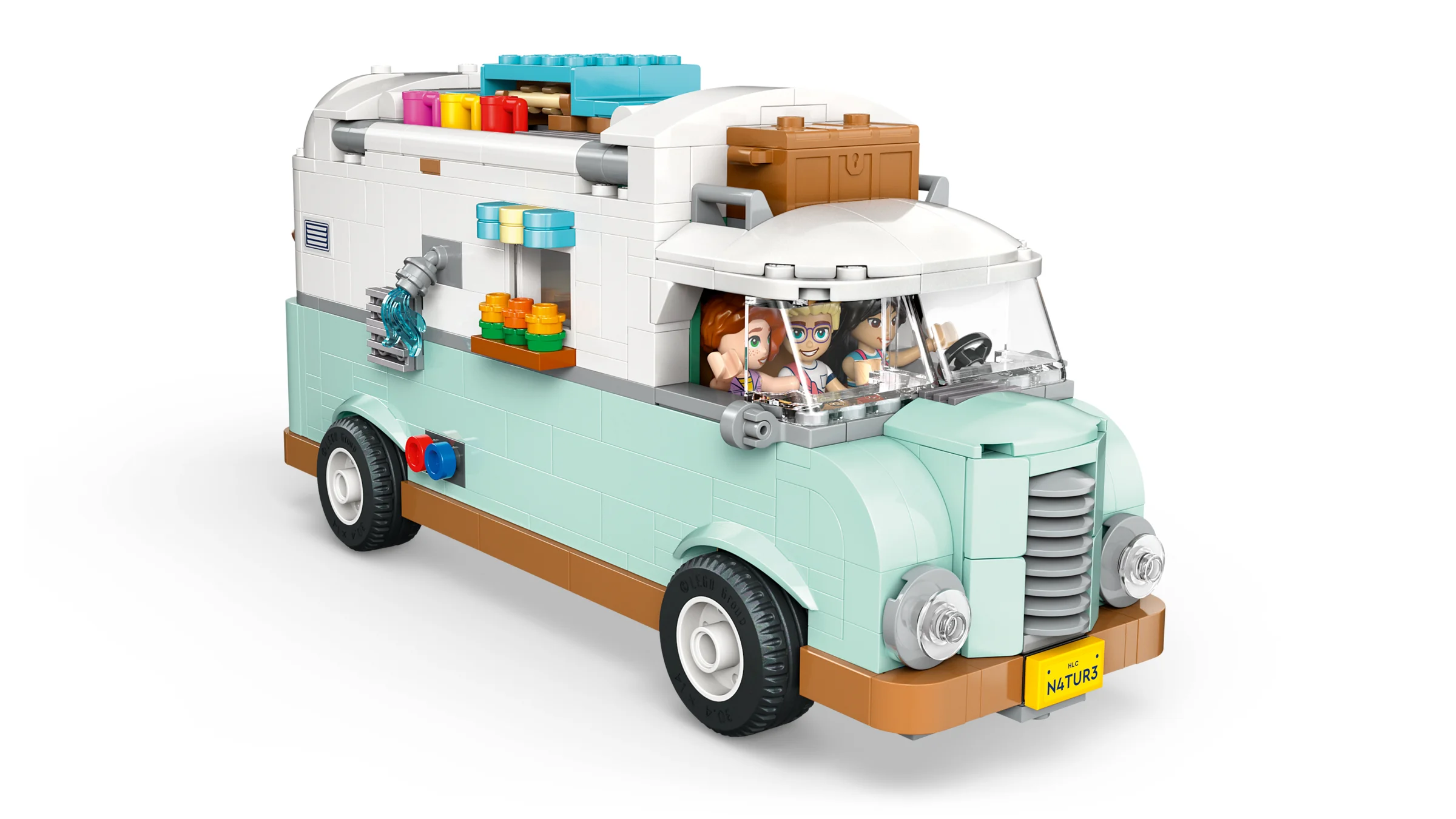 Imagine cu rulota LEGO Friends, modelul 42663, ce prezintă detaliile exterioare și minifigurinele.