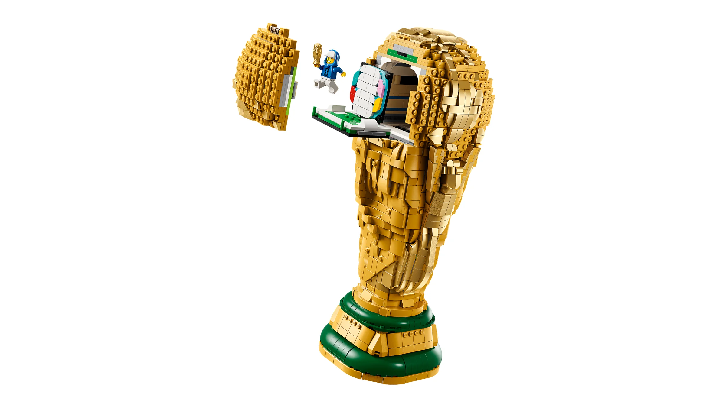 Trofeul Cupei Mondiale FIFA, deschis, cu o minifigurină în interior.