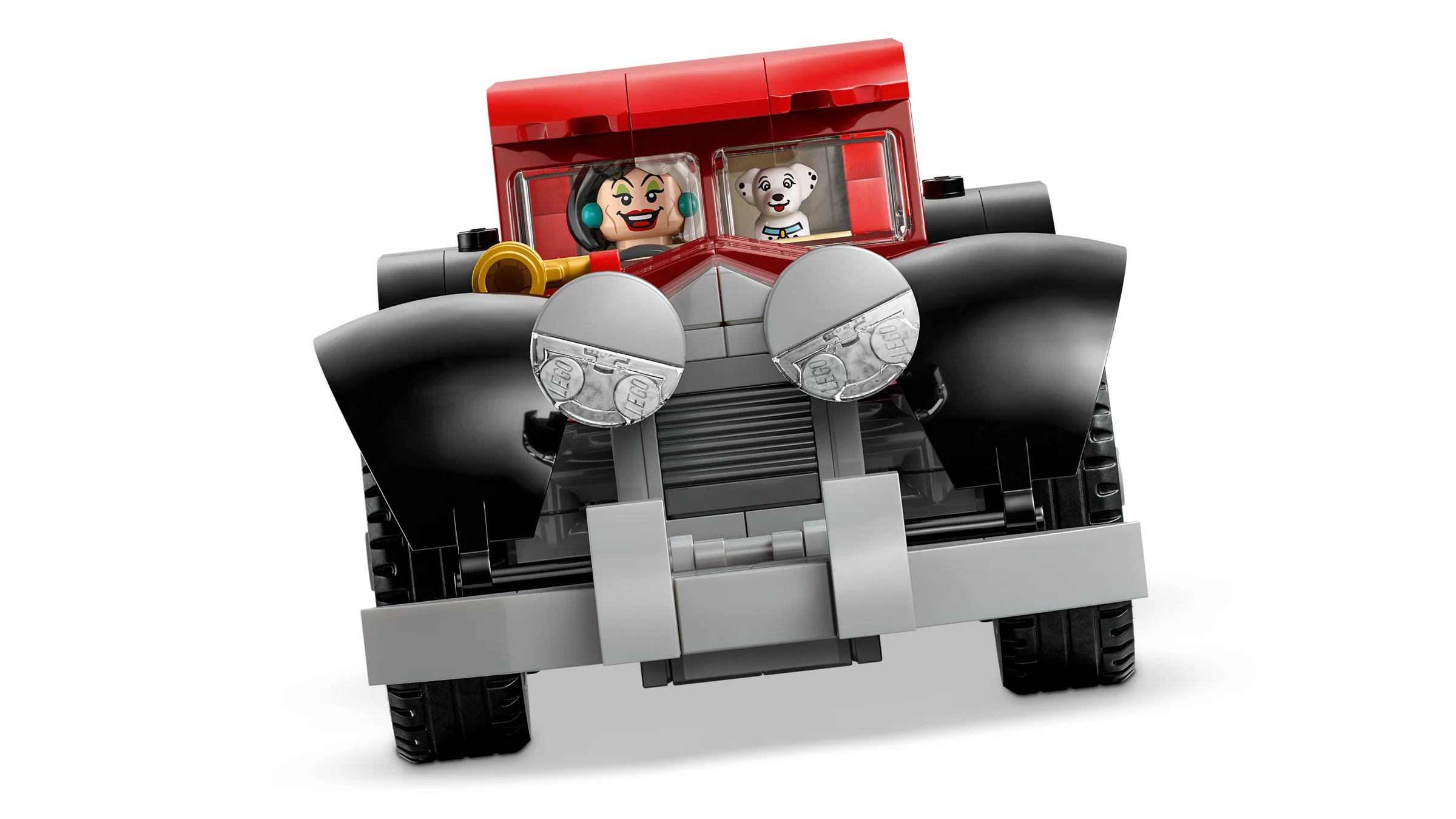 Mașina Cruellei De Vil din LEGO, cu Cruella și un cățel dalmațian înăuntru.