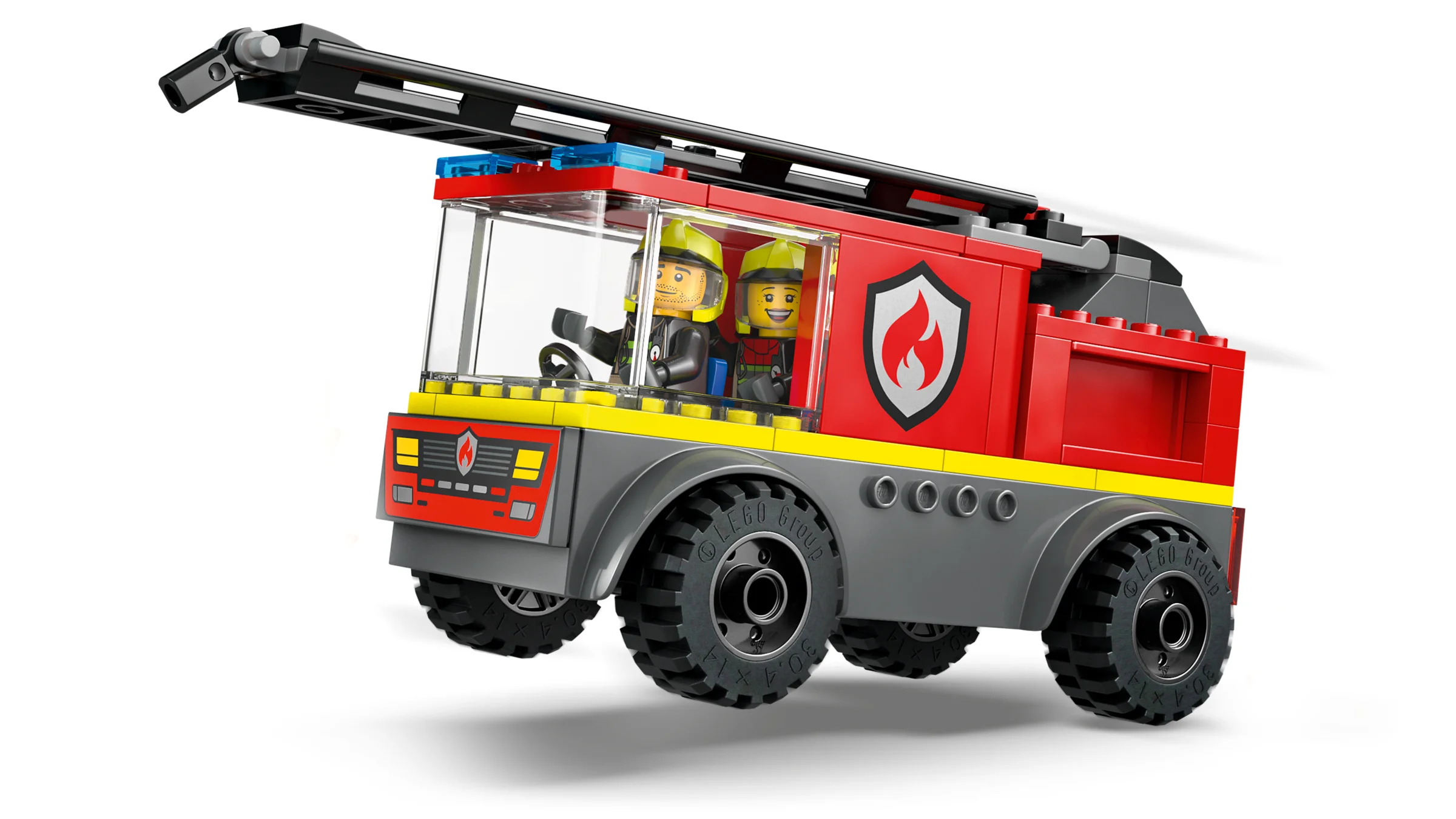 Camion de pompieri roșu și gri, cu două minifigurine zâmbitoare în cabină.