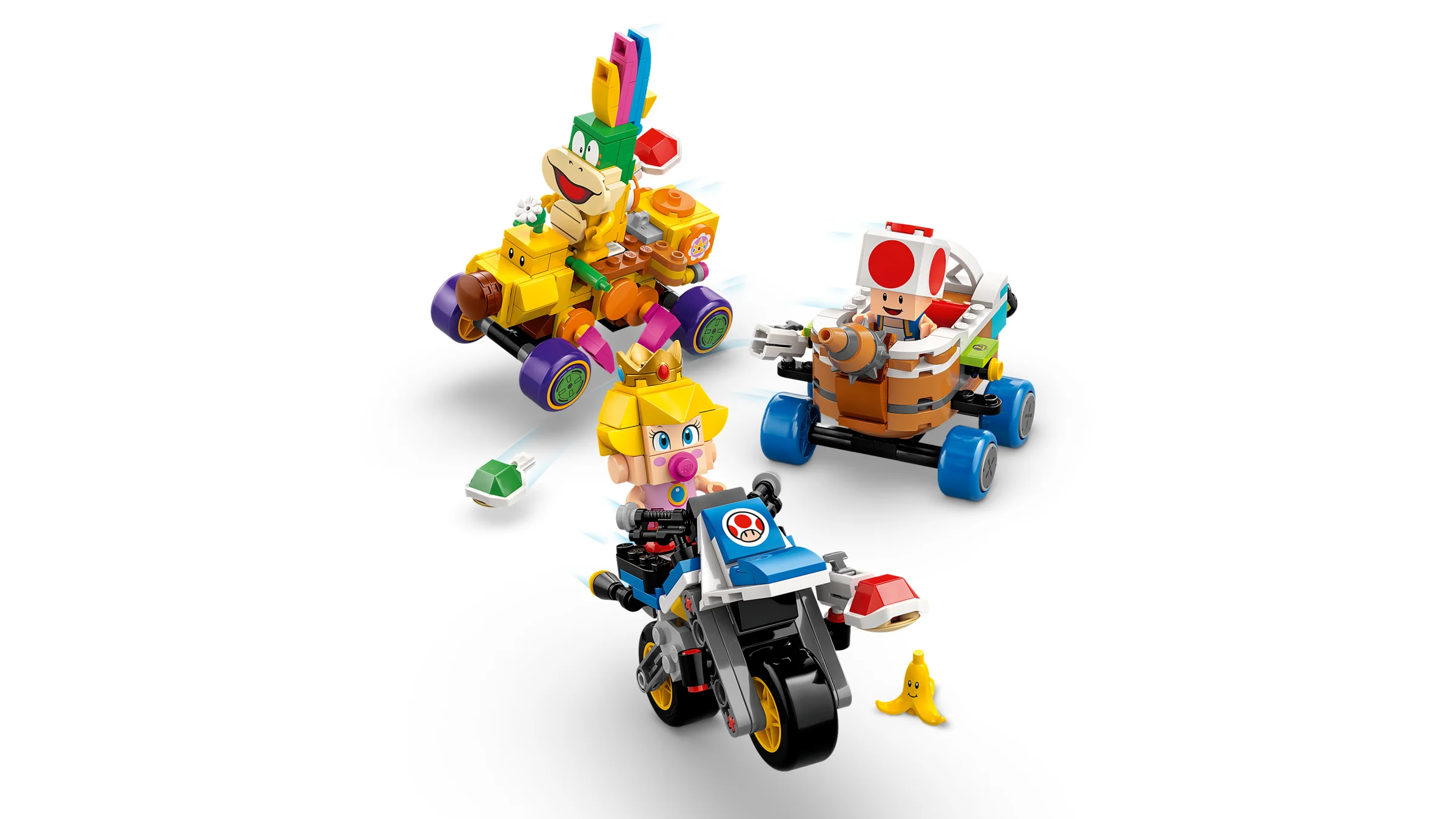 Imagine cu Baby Peach, Toad și Larry într-o cursă cu vehiculele lor construibile LEGO.