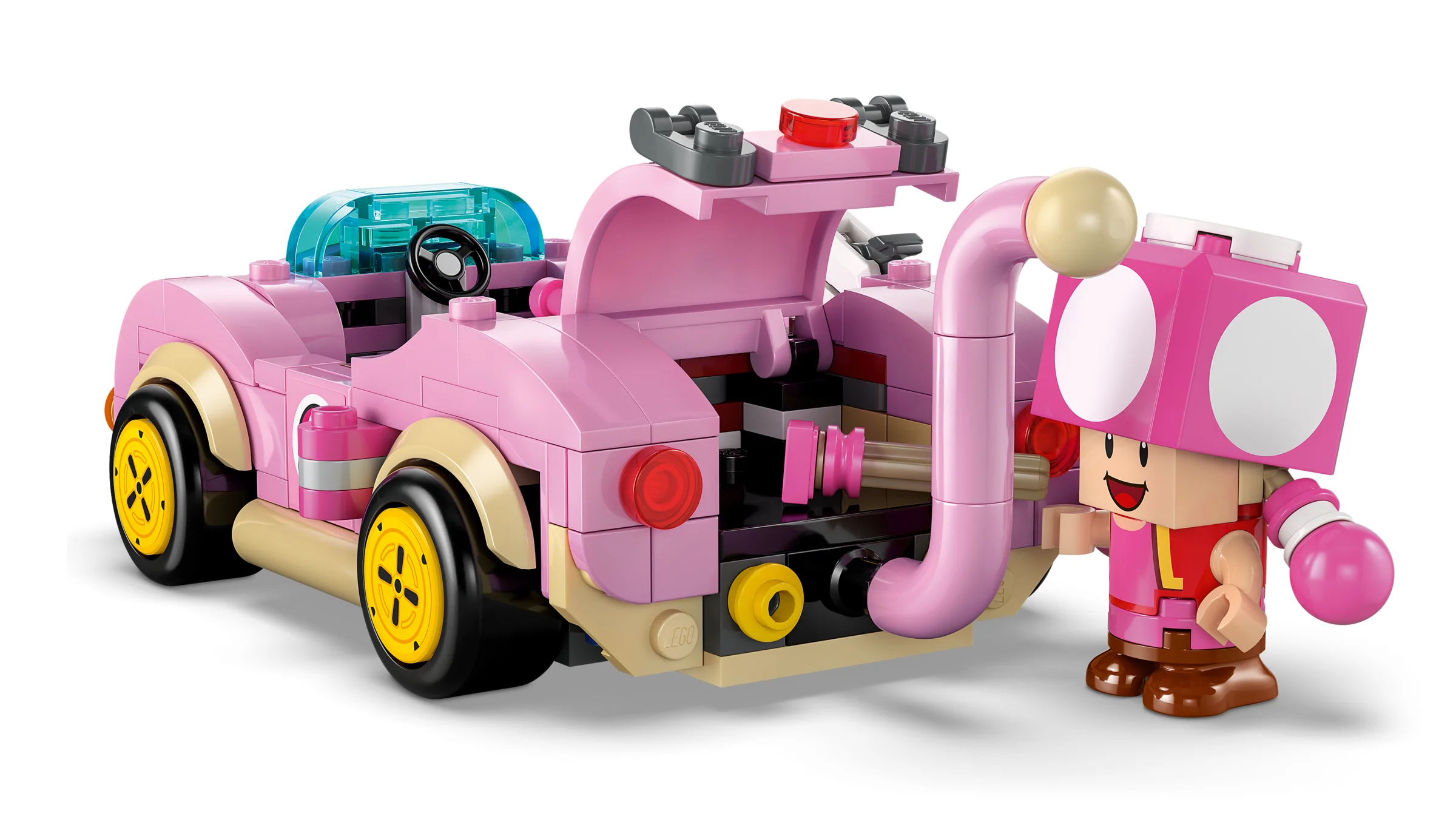 Set LEGO Super Mario cu mașină roz și figurină Toadette. Distracție interactivă garantată!