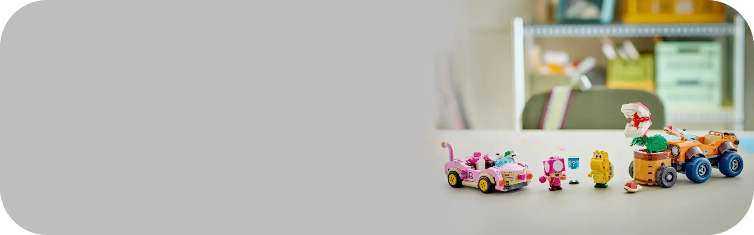 Set LEGO Super Mario 72044: Urmărirea cu planta Piranha, cu mașini și figurine.