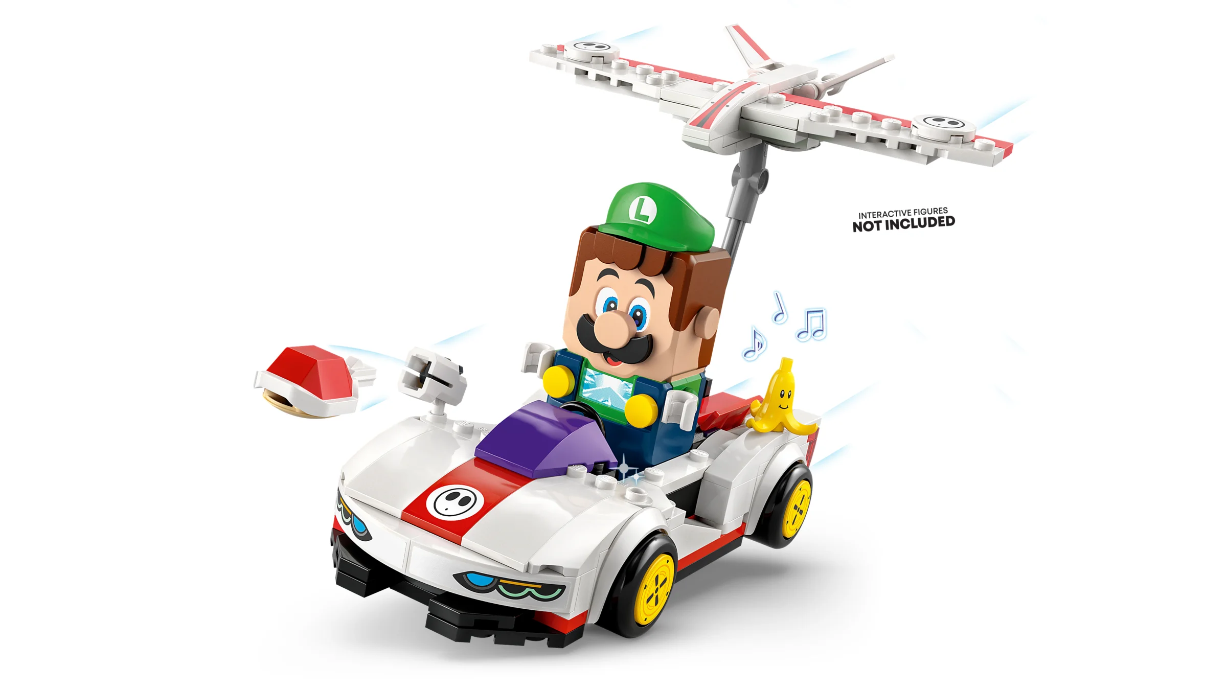 Luigi la volanul mașinii sale cu P-Wing deasupra. Distracție garantată cu acest set LEGO Super Mario.
