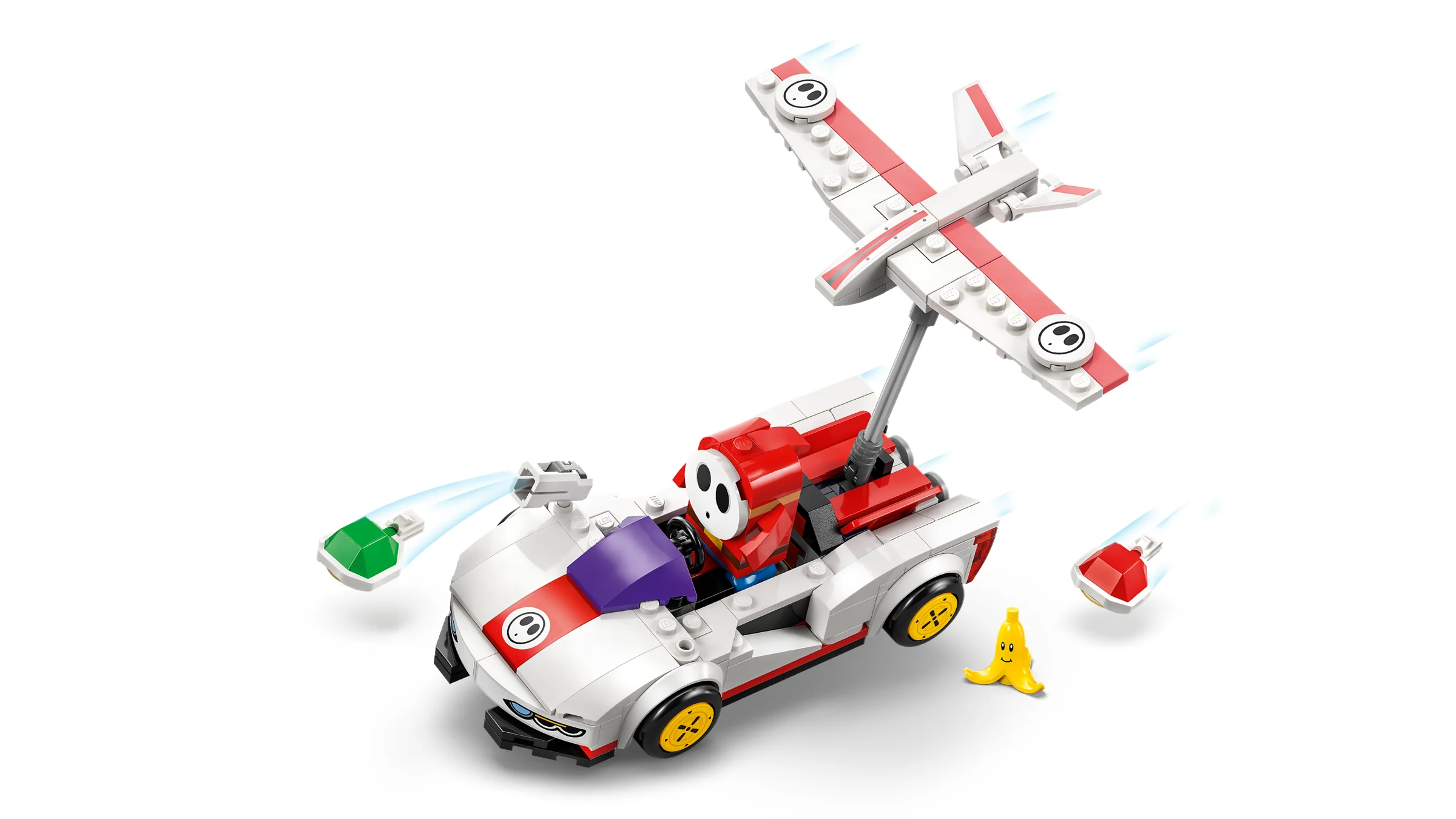 Imagine cu setul LEGO 72045 Shy Guy & P-Wing, cu mașina, avionul și accesoriile sale.
