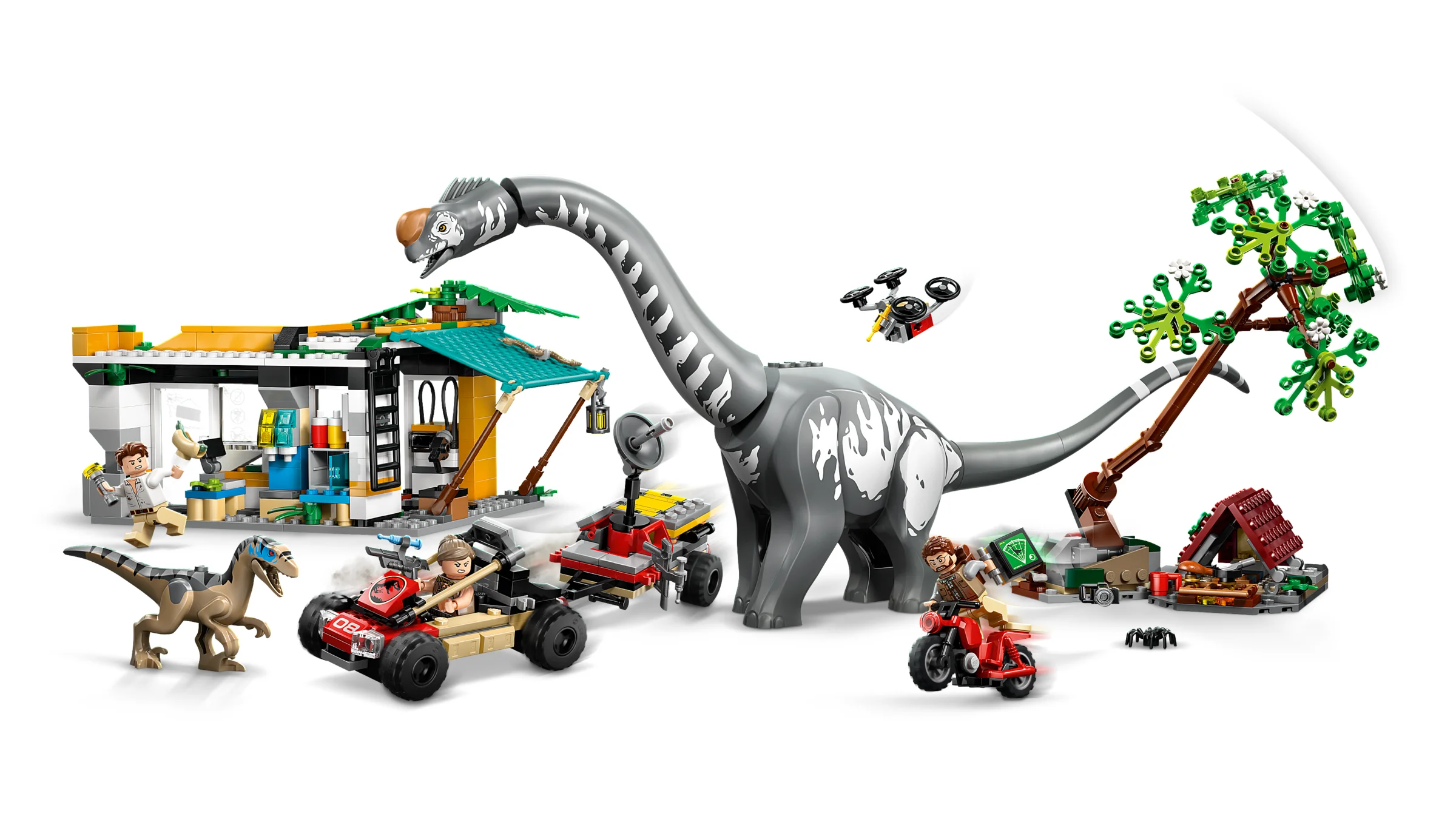 Imagine detaliată cu setul LEGO 76973, incluzând raptorul, titanozaurul și minifigurinele.
