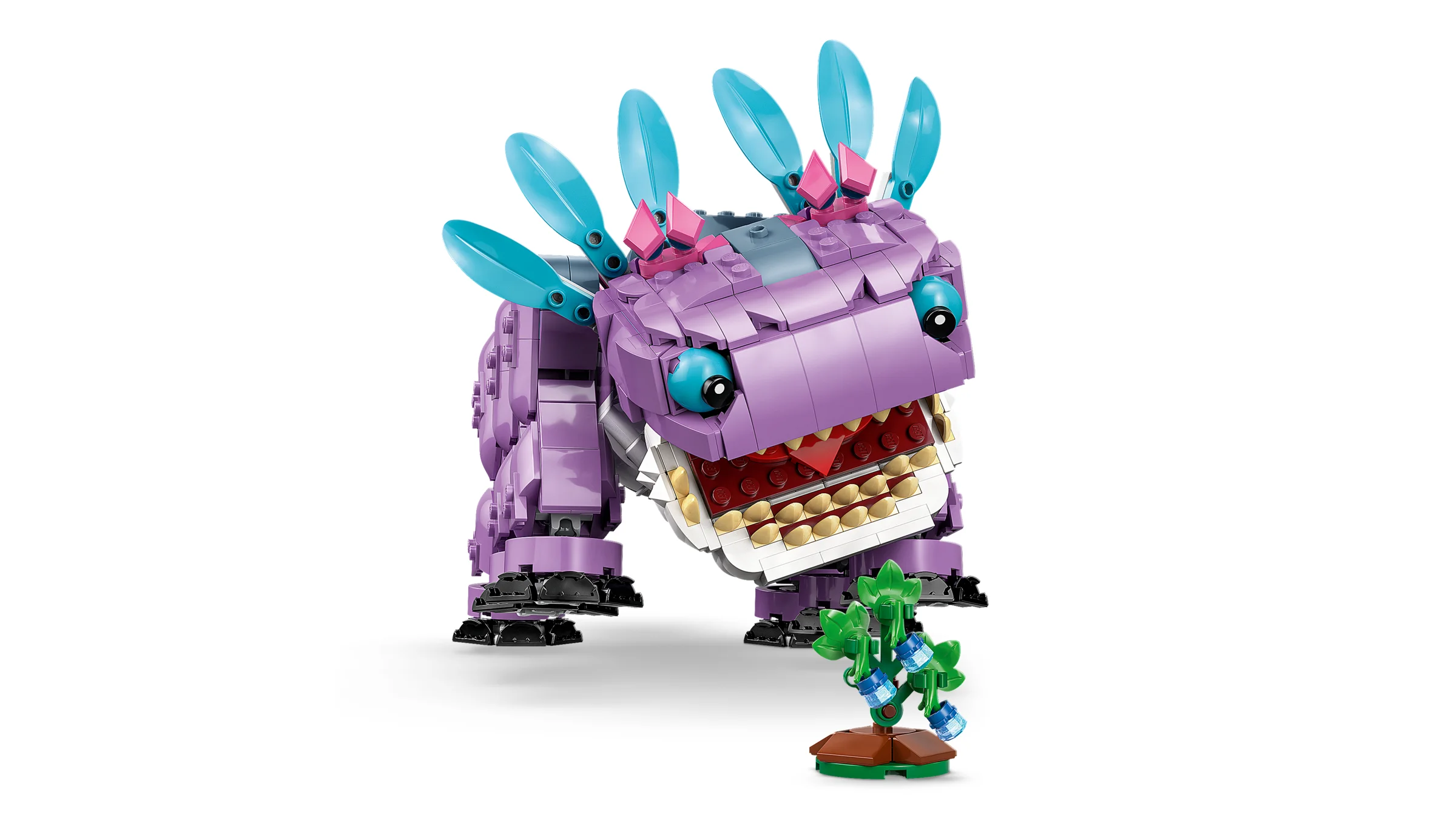 Imagine cu Klombo LEGO, o creatură violetă cu un tufiș cu fructe albastre.