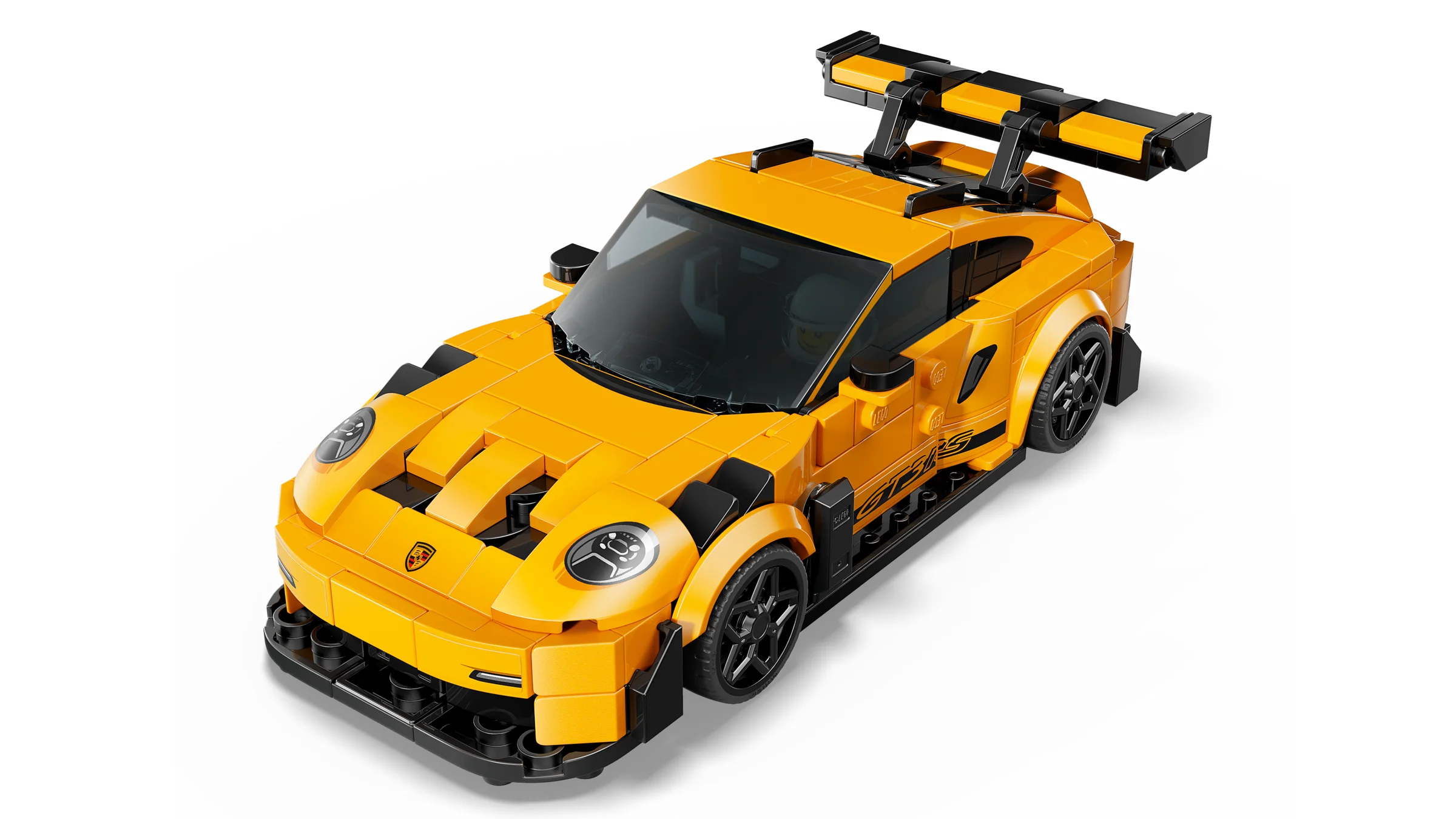 Imagine cu modelul LEGO Porsche 911 GT3 RS galben, văzut de sus. Detalii precise ale mașinii.