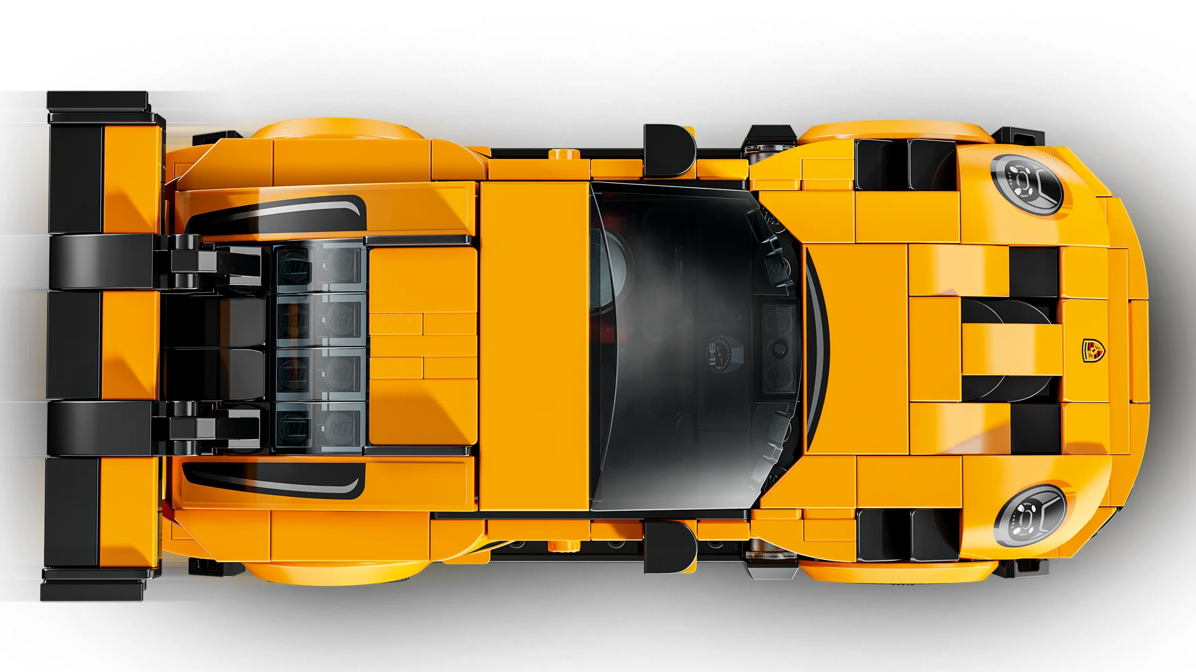Vedere de sus a modelului LEGO Porsche 911 GT3 RS, galben strălucitor.