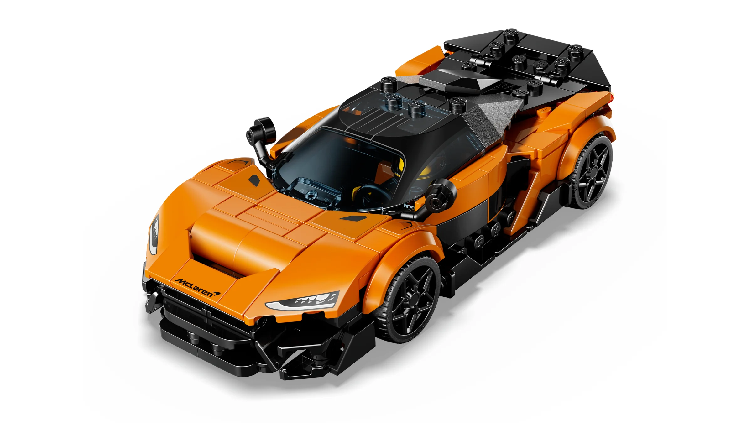 Imagine cu modelul LEGO McLaren Solus GT, portocaliu și negru. O reprezentare detaliată a mașinii.