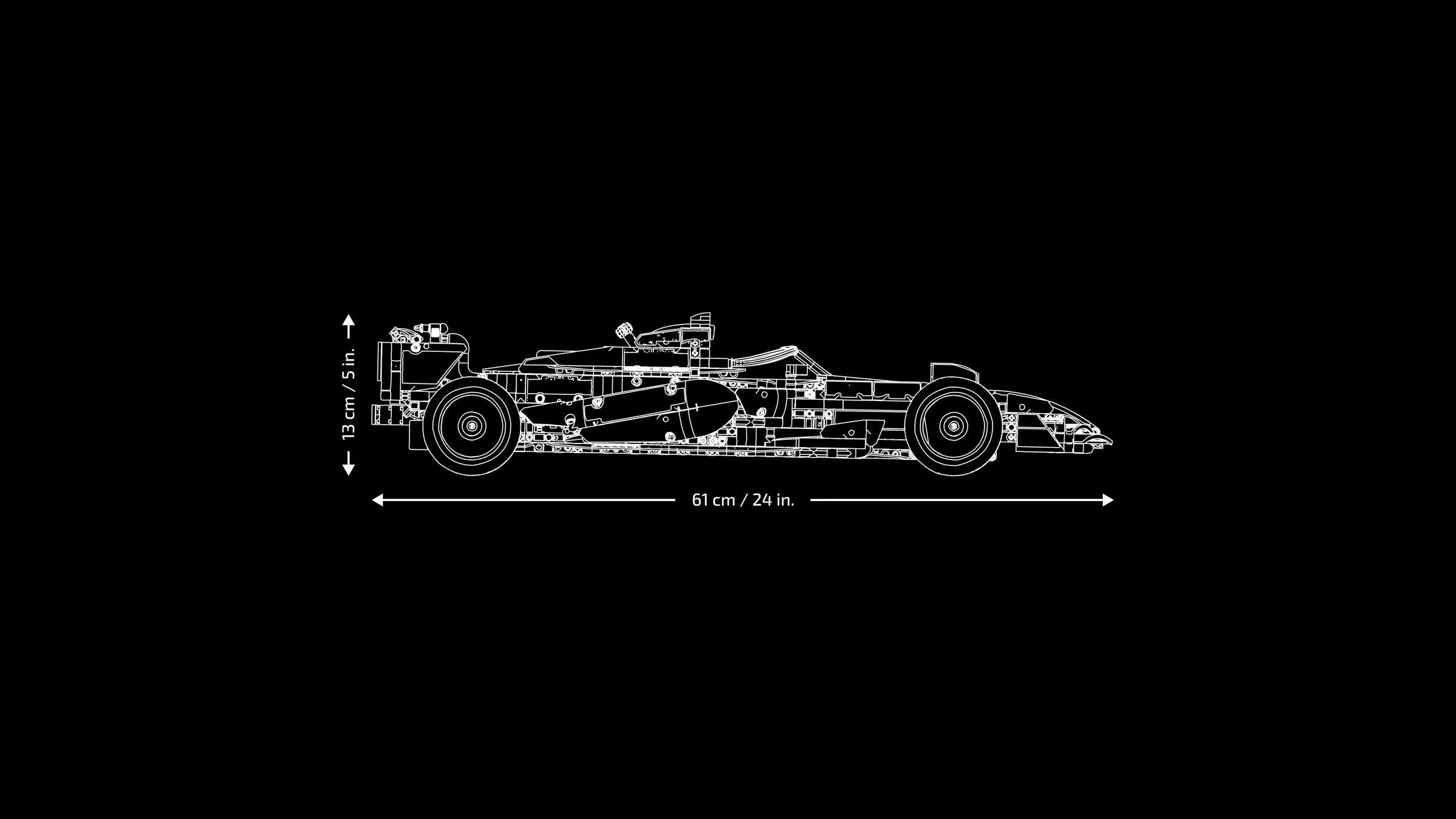 Schemă tehnică a modelului McLaren F1 MCL39, cu dimensiunile 61 cm lungime și 13 cm înălțime.