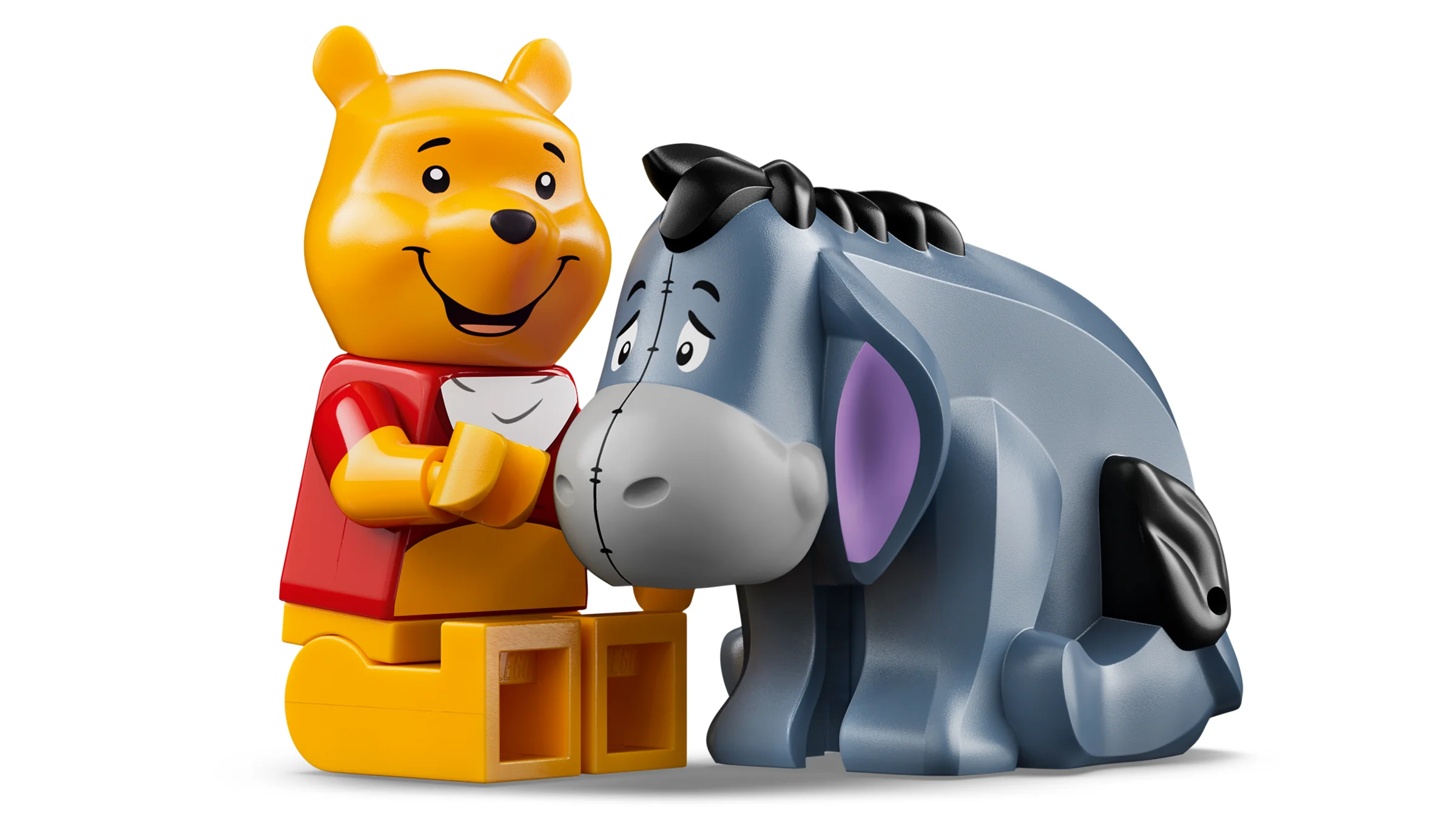 Winnie the Pooh și Eeyore construiți din cărămizi LEGO, zâmbitori și prietenoși.