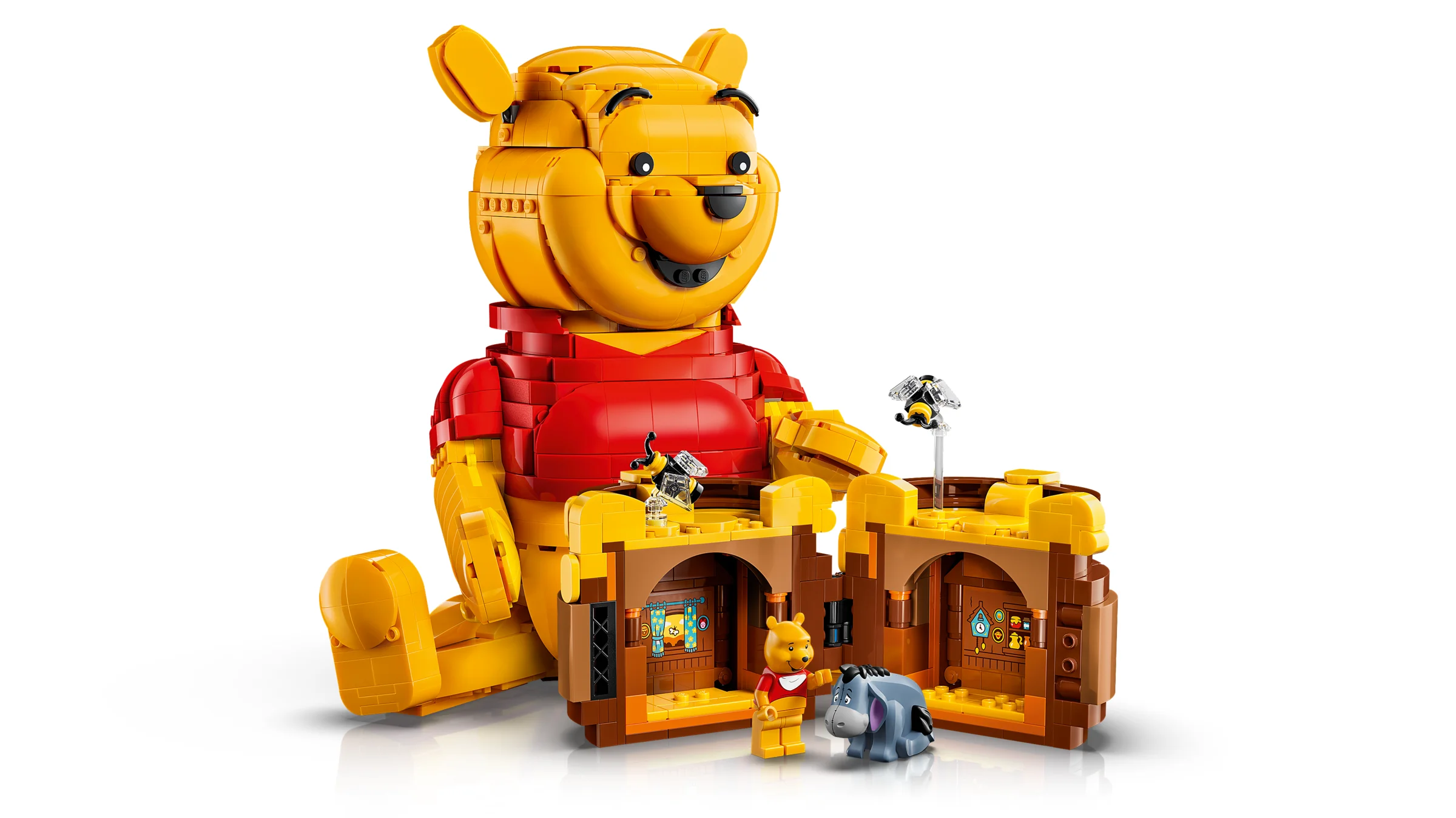 Winnie the Pooh mare, cu casa, Eeyore și minifigurina Pooh. Set Disney, aspect detaliat.