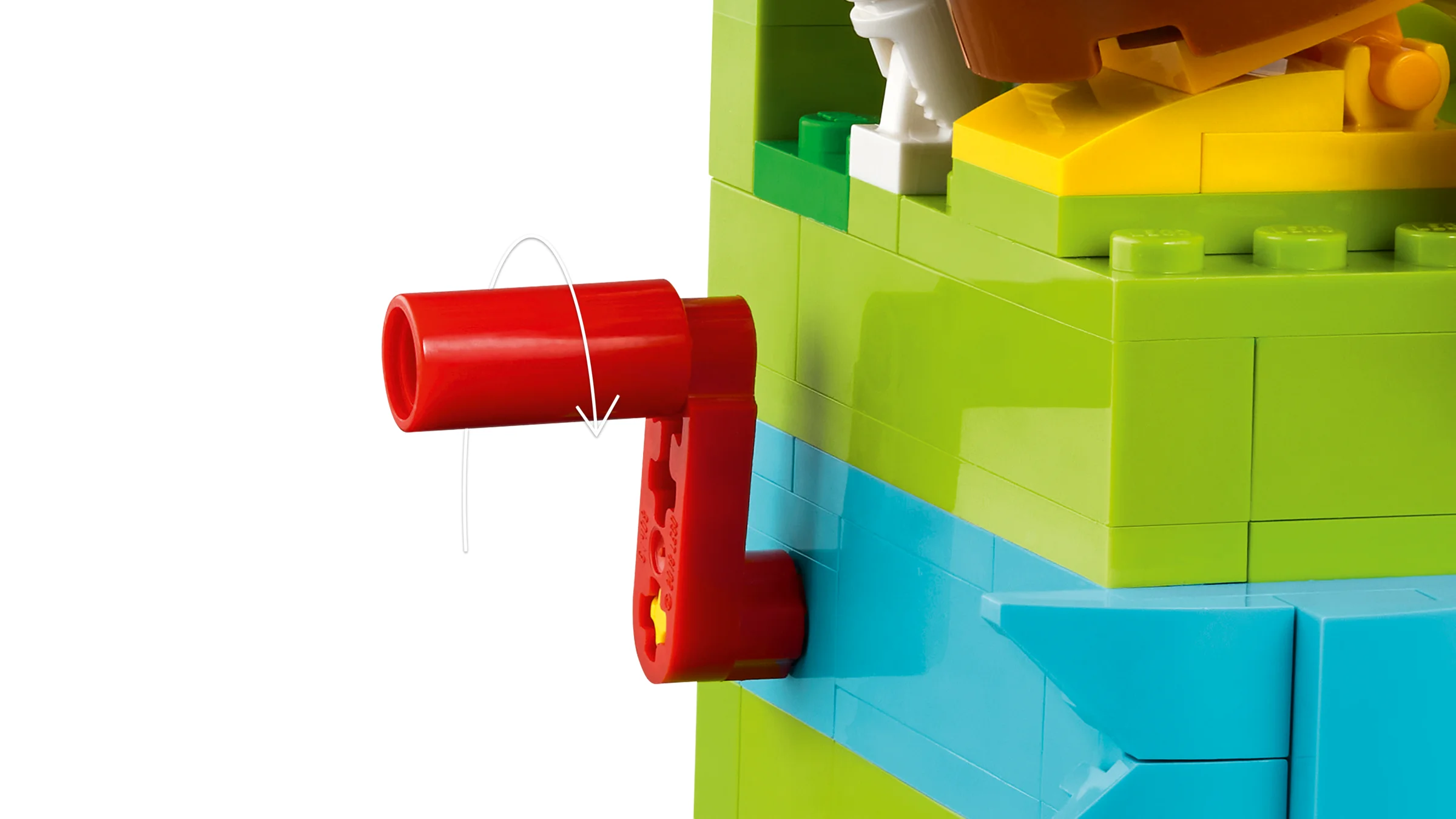 Detaliu cu manivela rotativă a cutiei cadou LEGO. Funcționalitate interactivă.