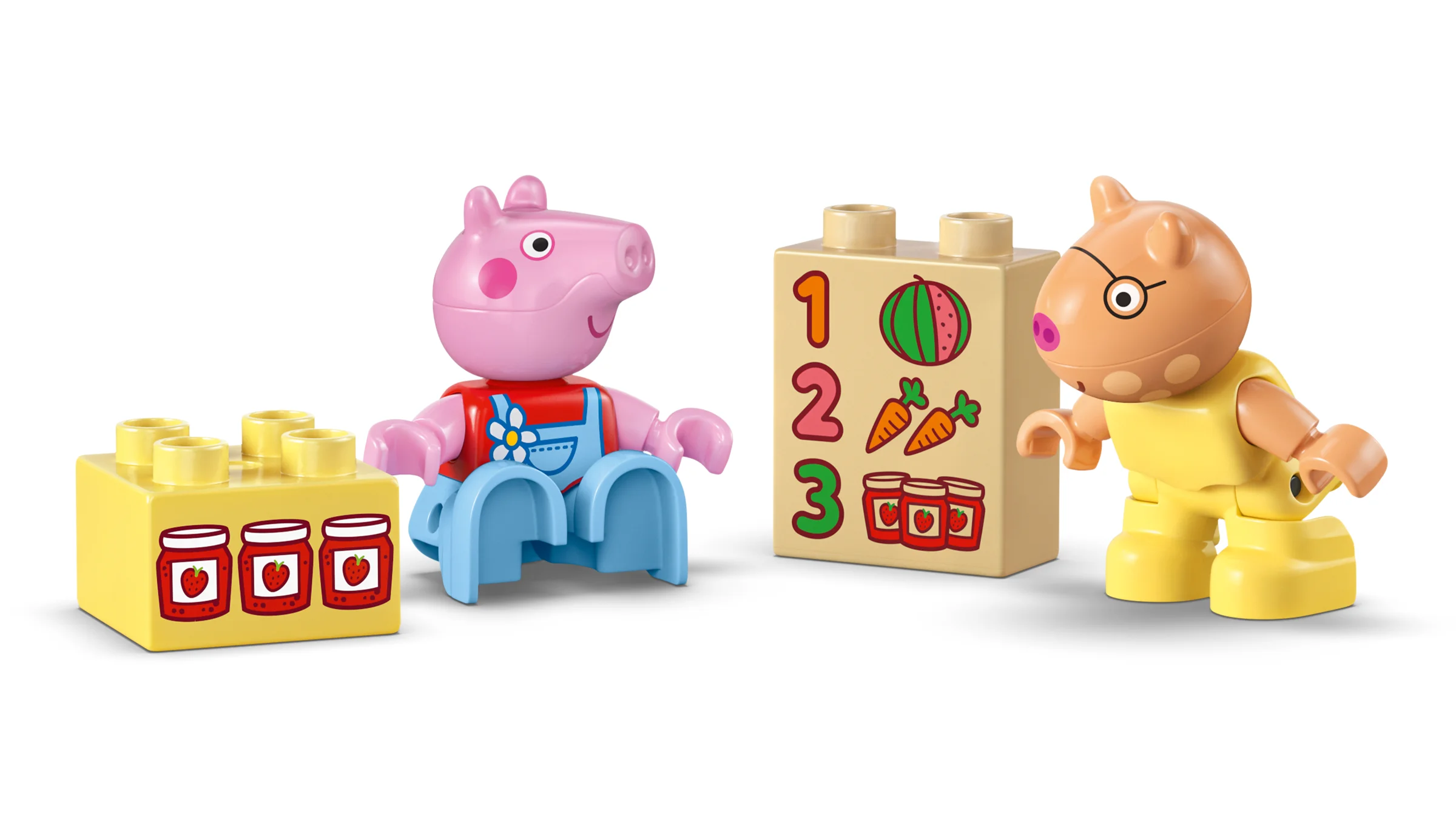 Imagine cu minifigurinele Peppa Pig și Daddy Pig alături de blocuri Duplo cu desene educative.