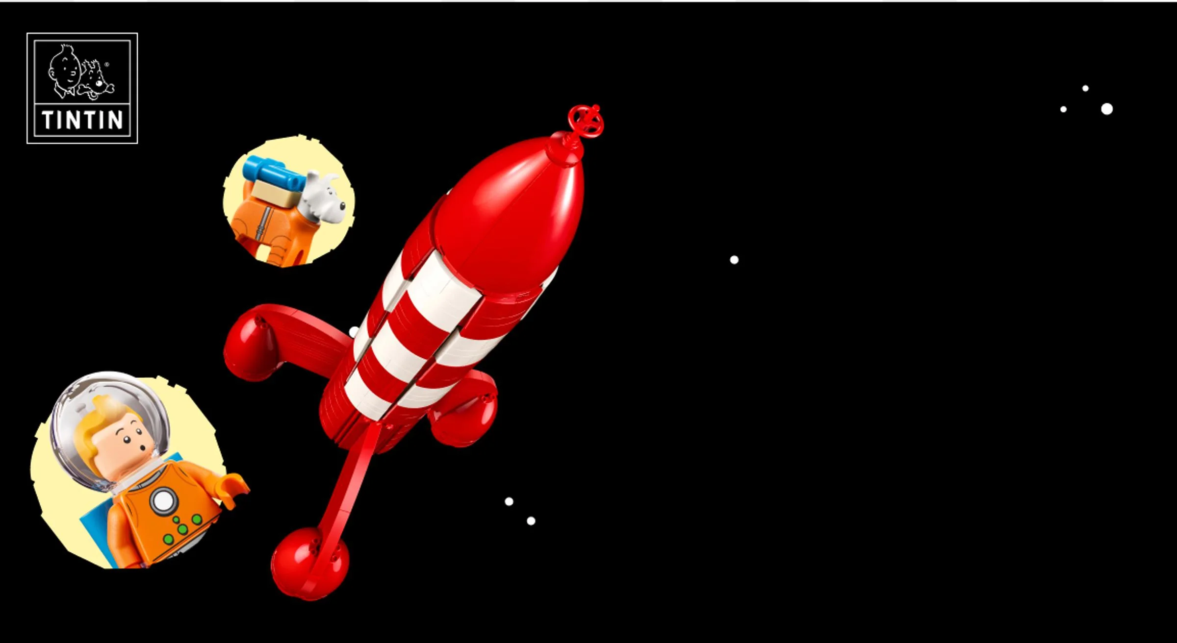 Racheta Tintin, iconică, roșie și albă, alături de minifigurinele lui Tintin și Snowy.