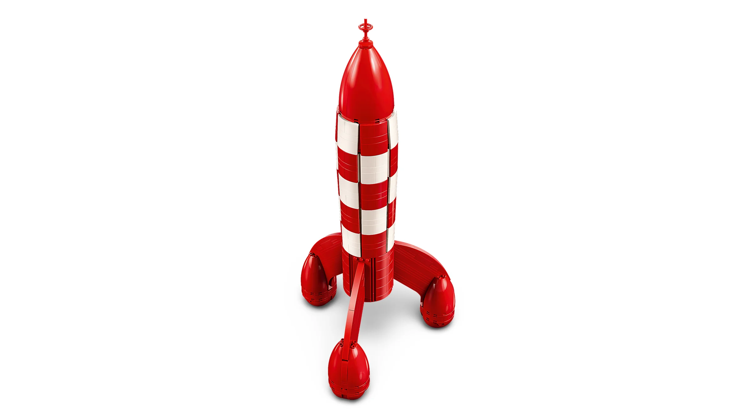Racheta Tintin pe Lună din cărămizi LEGO, roșie și albă, pe un fundal alb.