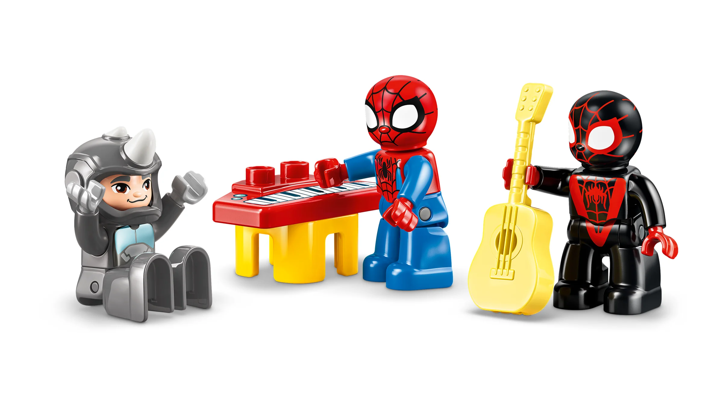 Imagine cu mini-figurinele Spidey, Rhino și Miles Morales cântând la pian și chitară.