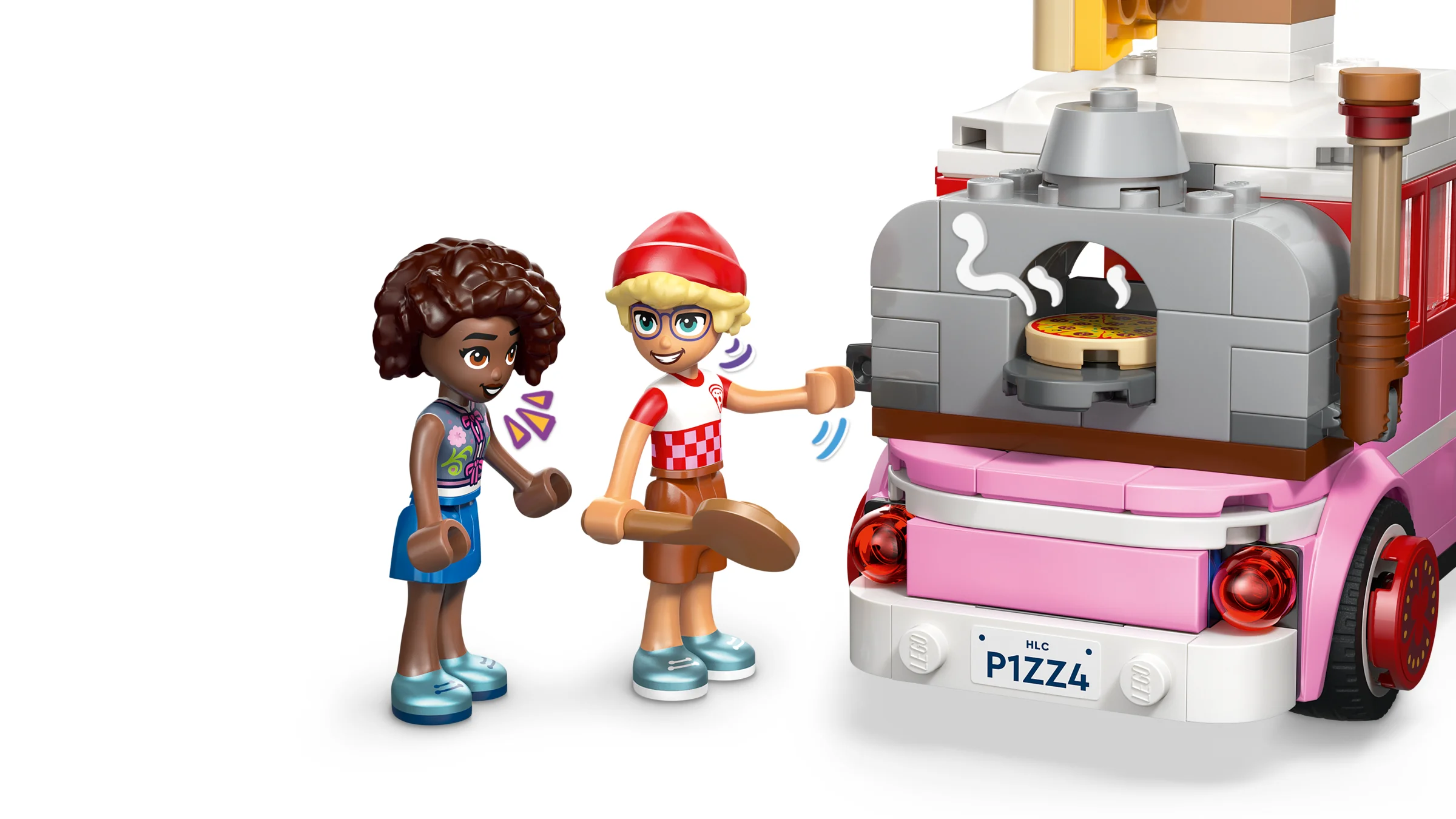 Două minifigurine stau lângă cuptorul de pizza din camionul de pizza LEGO Friends.