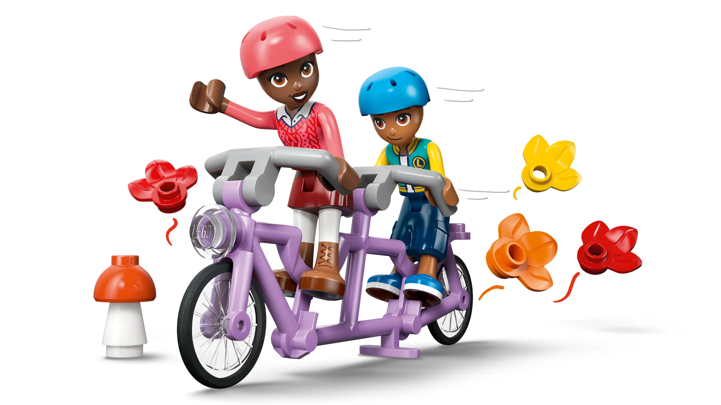 Două minifigurine pe o bicicletă tandem violetă, cu accesorii florale colorate.