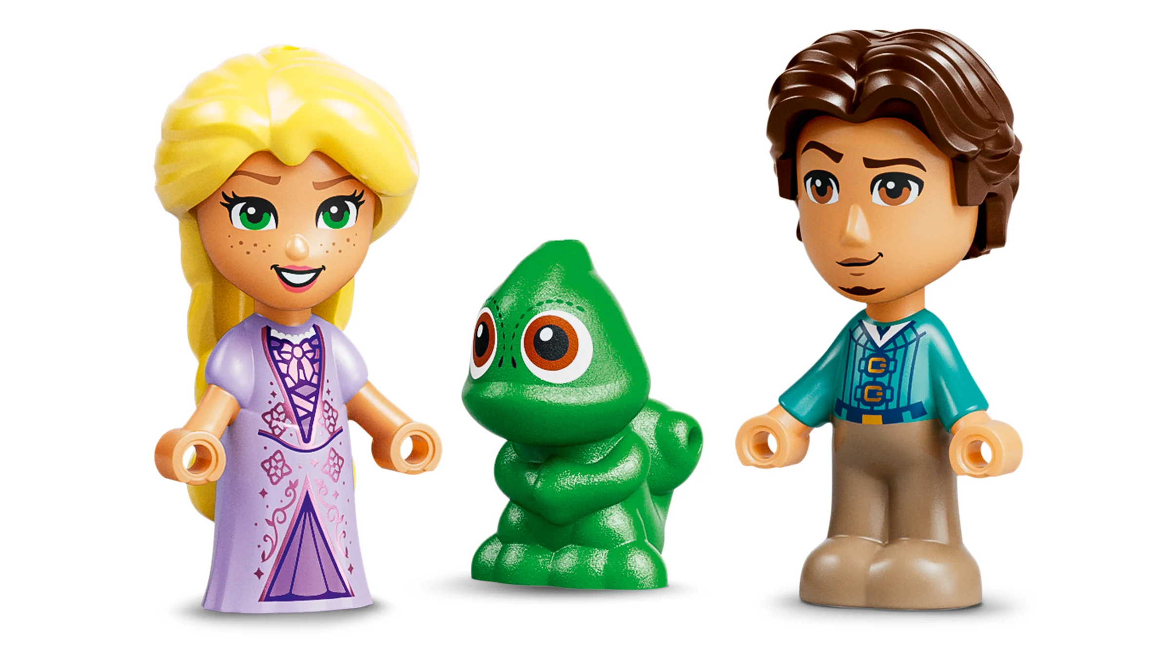 Prim-plan cu mini-figurinele Rapunzel, Flynn și Pascal. Detalii ale personajelor din film.