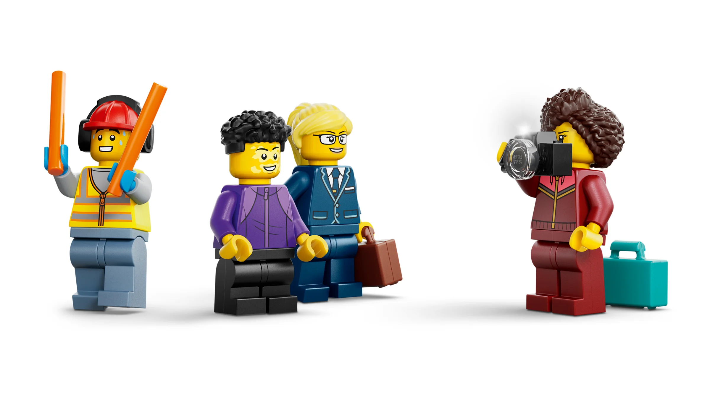 Imagine cu minifigurinele LEGO: controlor de trafic, pasageri și fotograf.