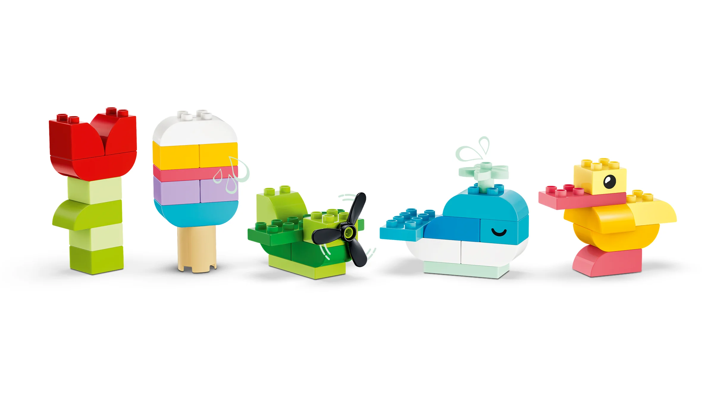 Imagine cu modele colorate DUPLO: floare, înghețată, avion, balenă, rață. Ideal pentru copii mici.