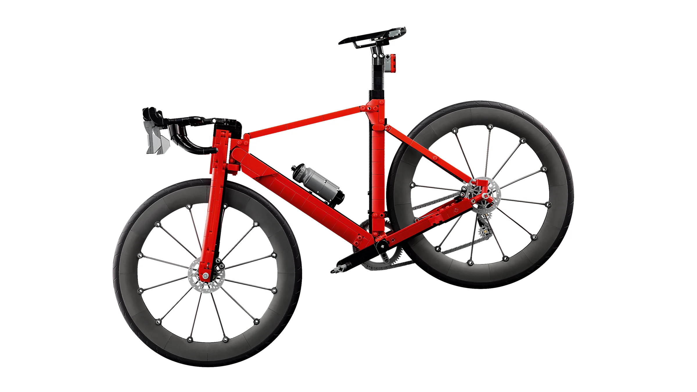 O bicicletă de curse roșie, detaliată, realizată din piese LEGO. Design aerodinamic și aspect realist.