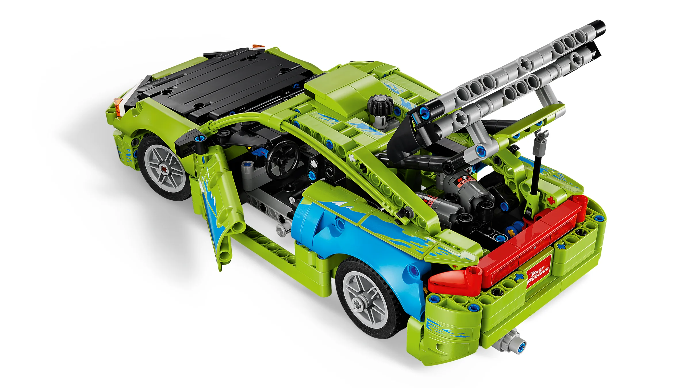 Imagine cu mașina Mitsubishi Eclipse Technic, verde și albastră, cu capota și portierele deschise.