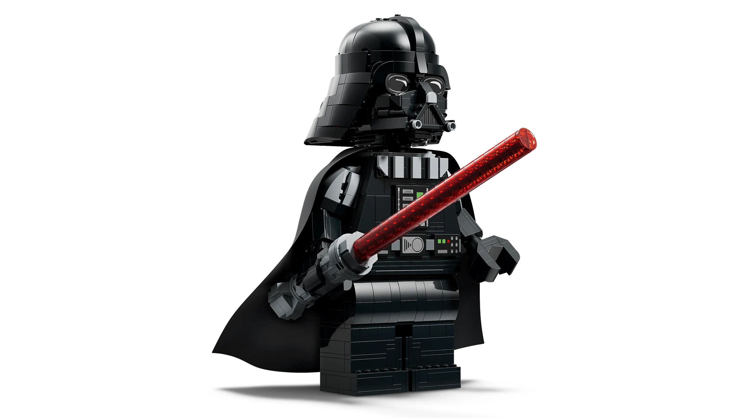 Imagine cu Darth Vader LEGO la scară mărită, cu sabie laser roșie, pe fundal alb.