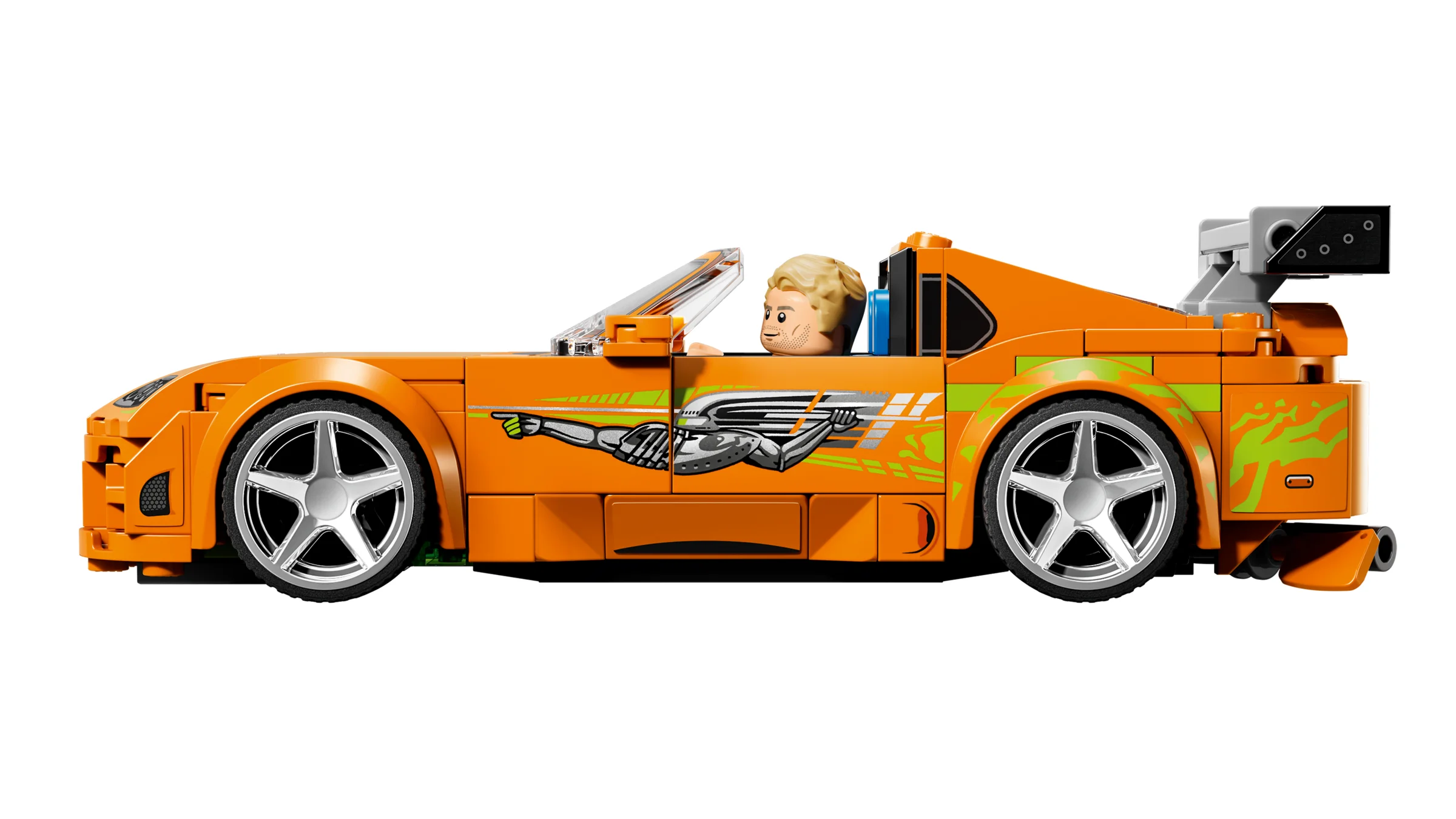 Imagine laterală detaliată cu Toyota Supra MK4 din setul LEGO Fast & Furious. Caroserie portocalie și minifigurină.
